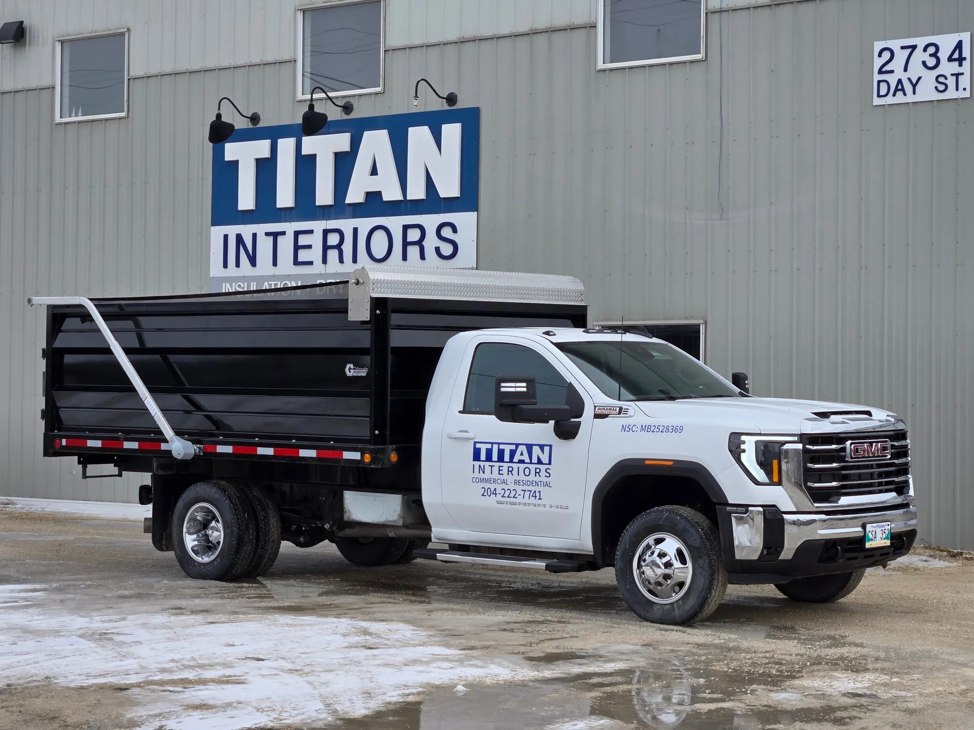 Titan Interiors branded work truck at 2734 Day St